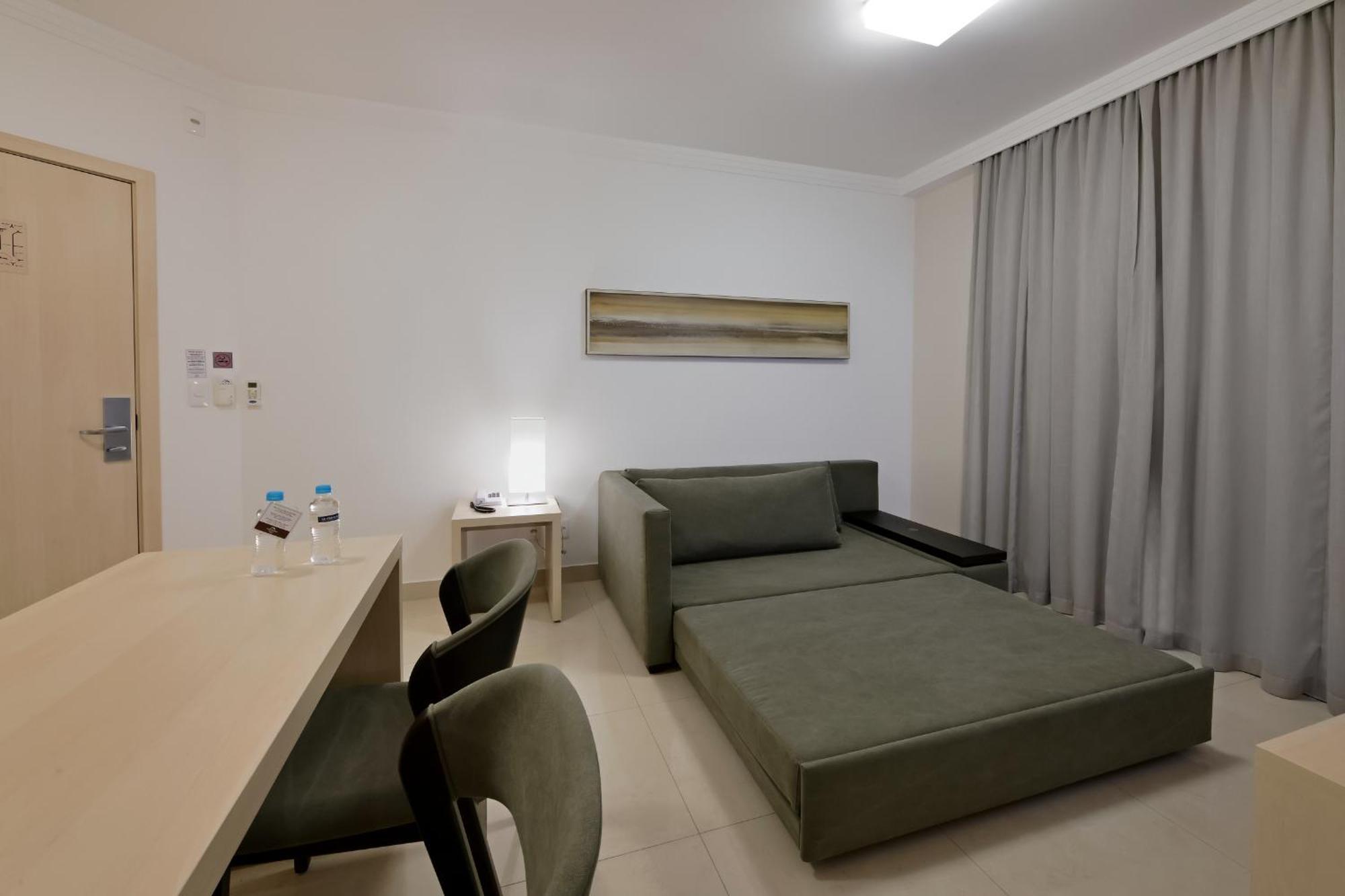 Hotel Mont Blanc Premium ฮิเบเราเปรโต ห้อง รูปภาพ A sofa bed